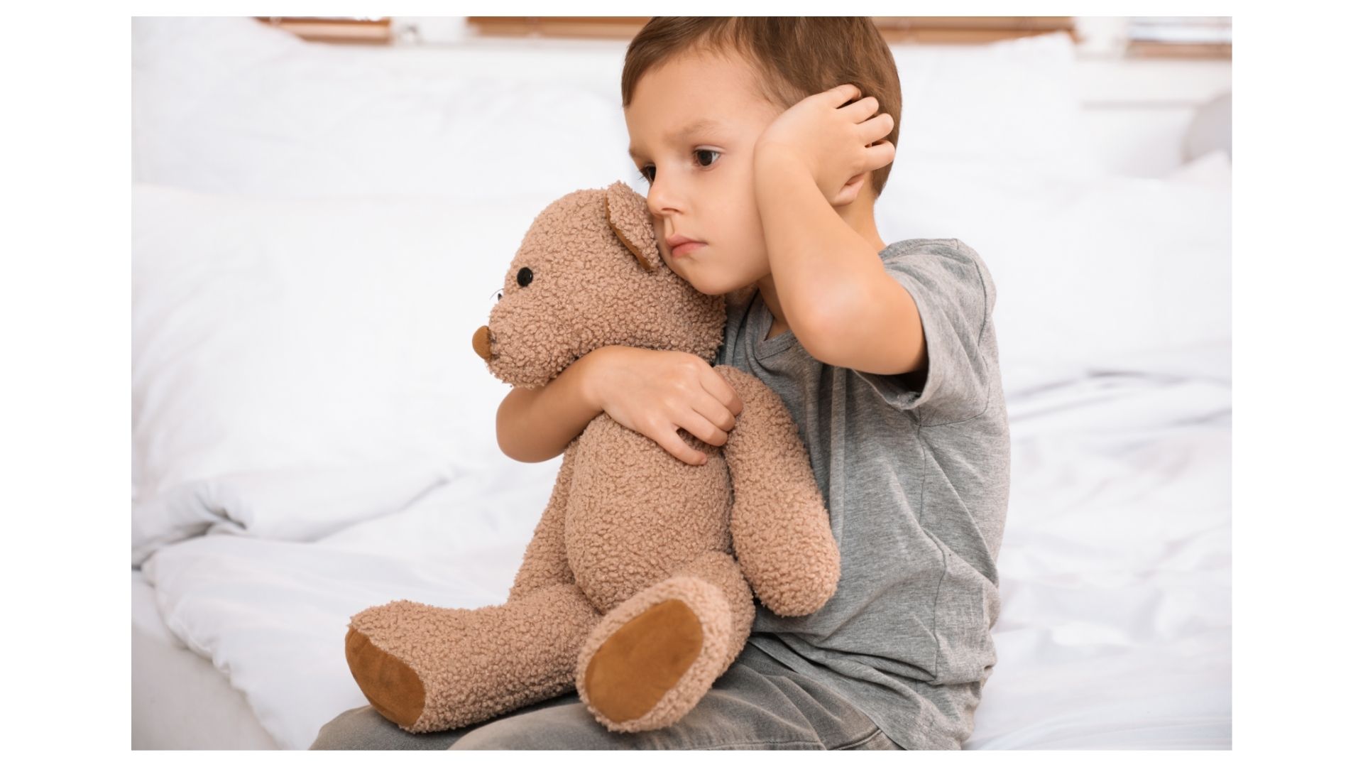 Child with ear pain - natural chiropractic ear infection treatment at Thrive Chiropractic in Topeka Kansas
