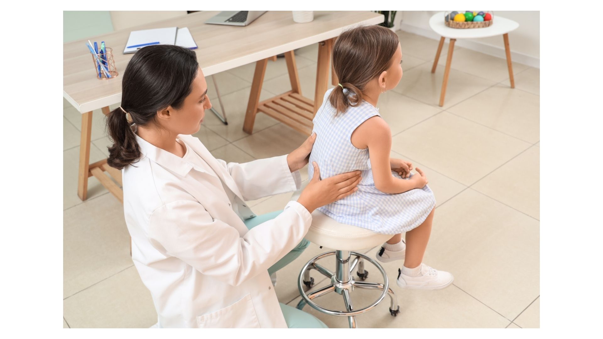 Pediatric scoliosis assessment and chiropractic care for children and teens at Thrive Chiropractic in Topeka Kansas